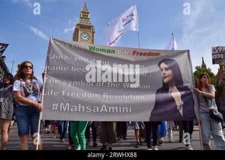 London, UK. 16th Sep, 2023. Protesters hold a banner in remembrance of Mahsa Amini during the march in Parliament Square. British Iranians held several protests around London against the Iran regime to mark the anniversary of the death of Mahsa Amini, as well as the protests and the government crackdown which followed in Iran. Credit: SOPA Images Limited/Alamy Live News Stock Photo