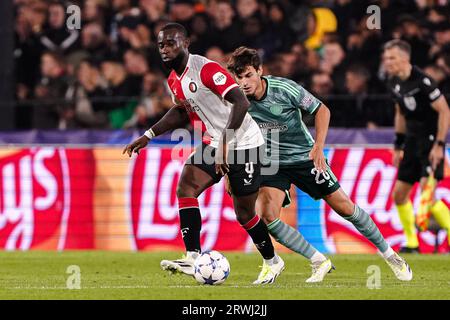 Rotterdam, Netherlands. 19th Sep, 2023. ROTTERDAM, NETHERLANDS - SEPTEMBER 19: Lutsharel Geertruida of Feyenoord battles for possession with Paulo Bernardo of Celtic during the UEFA Champions League Group E match between Feyenoord and Celtic at Stadion Feyenoord on September 19, 2023 in Rotterdam, Netherlands. (Photo by Andre Weening/Orange Pictures) Credit: Orange Pics BV/Alamy Live News Stock Photo