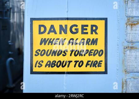 sign: Danger when Alarm sounds Torpedo is about to fire Stock Photo