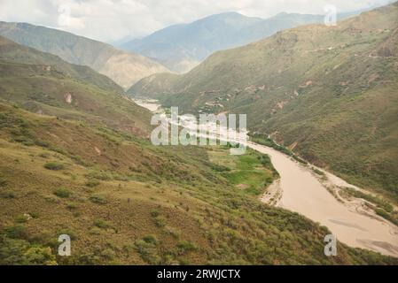 Andean scenery, river flowing through the mountains in the Chicamocha Canyon, a popular tourist destination in Santander, Colombia. Stock Photo