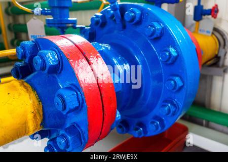 Connection unit for metal pipes with large bolts. Supply of natural gas through pipes. Preparing for heating season. Stock Photo