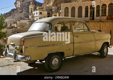 A vintage volvo in Maaloula, an Aramaic-speaking Christian town built on rugged mountains in Syria Stock Photo