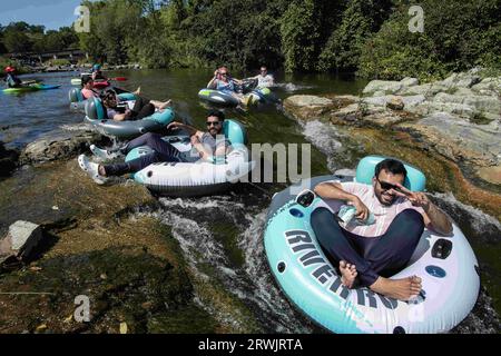 Ann Arbor, Michigan, USA. 3rd Sep, 2023. People enjoy the hot weather on Labor Day Weekend by floating down The Argo Cascades. The Cascades is a series of nine small rapids that connect two parts of the Huron River in Ann Arbor. (Credit Image: © Mark Bialek/ZUMA Press Wire) EDITORIAL USAGE ONLY! Not for Commercial USAGE! Stock Photo