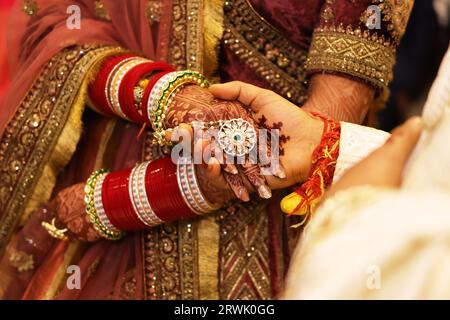 Bride groom holding each other hand, indian wedding Stock Photo
