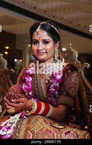 Beautiful indian bride smiling and looking at camera Stock Photo