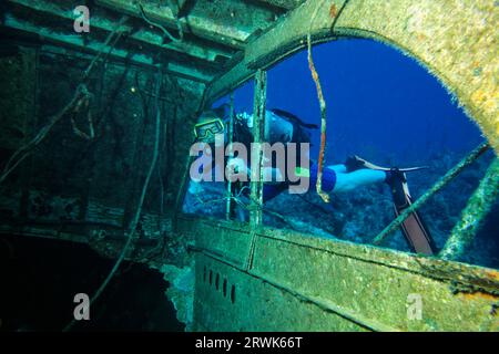 Scuba diver in shipwreck, Cayo Largo Cuba Stock Photo