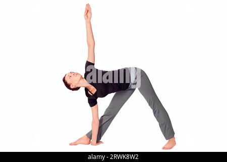 young fit woman doing yoga exercise called triangle pose sanskrit name trikonasana isolated on white background 2rwk8w2