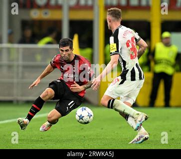 Milan, Italy. 19th Sep, 2023. AC Milan's Christian Pulisic (L) vies with Newcastle United's Sean Longstaff during their UEFA Champions League Group F match in Milan, Italy, on Sept. 19, 2023. Credit: Str/Xinhua/Alamy Live News Stock Photo