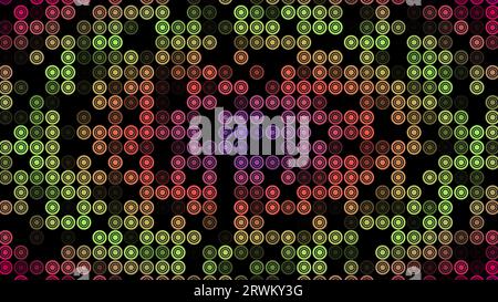 Multicolored flashing circles on a black background. Abstract festive background for advertising, congratulations, text. Colorful creative flat dynami Stock Photo