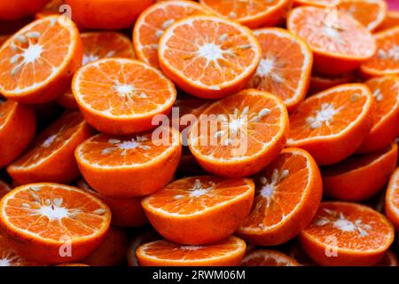 Orange fruit with orange slices Stock Photo