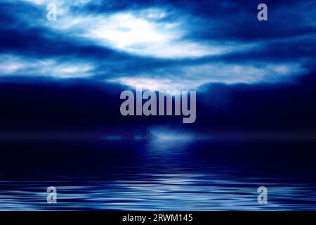 dark still water of a lake or ocean with dramatic stormy sky above Stock Photo