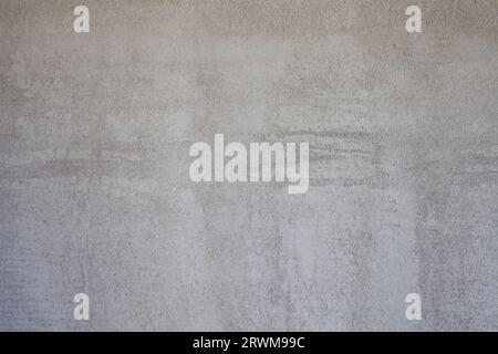 The light gray wall is leveled with facade putty. Stock Photo