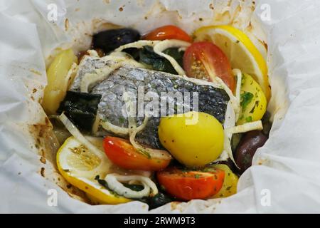 mediterranean cuisine sea bass papillote Stock Photo