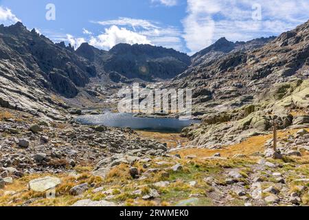 Laguna Grande de Gredos in Sierra de Gredos, landscape with high rocky mountains in the background, autumn view. Stock Photo