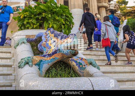 BARCELONA, SPAIN - MAY 16, 2017: This is a huge lizard-fountain on the bowl of a double staircase in the monumental area of Park Guell. Stock Photo