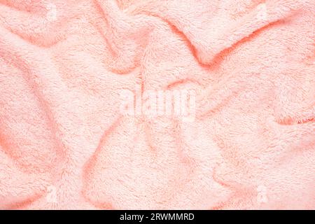soft pink texture of bath towel folded, background Stock Photo