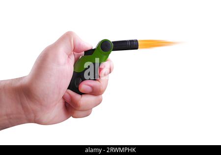 Hand holding a gas lighter isolated on a white background, cigarette lighter or jet lighter in hand. Stock Photo