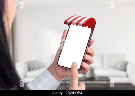 Woman use smart phone with red white awning on phone display concept. Isolated screen for mockup, app or web page presentation Stock Photo