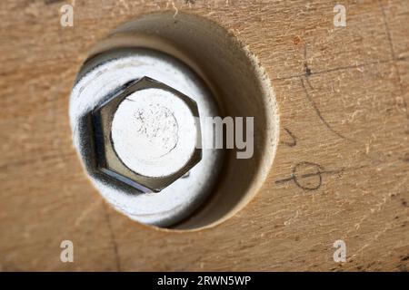 Wood bolted connection with nut and metal washer Stock Photo