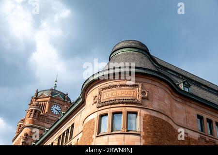 Stockholm Sweden, Central Post Office Building, under view of upper part of Centralposthuset. Heritage of old architecture, tower with dome and clock. Stock Photo