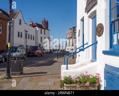 Houses on Bath Square, The Spice Island and Still and West public houses on Portsmouth Point in the distance Stock Photo