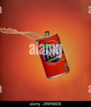 Mansfield,Nottingham,United Kingdom,20th September 2023:Studio product image of a suspended can of Fanta with the pop splashing out of the can. Stock Photo