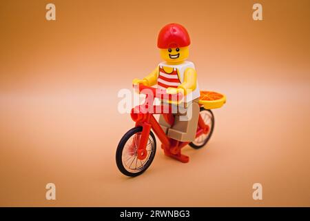 Pizza delivery guy on his bike Stock Photo