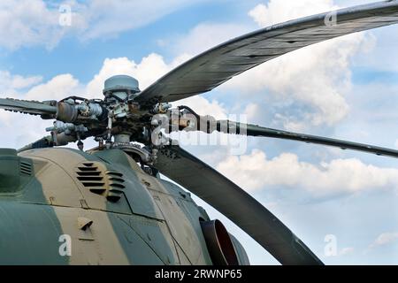 Old Soviet-made camouflage Mi-24 military helicopter propeller Stock Photo