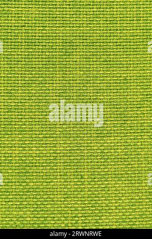Texture background of velor green fabric. Fabric texture of upholstery furniture textile material, interior design, wall decor. Fabric texture close-u Stock Photo
