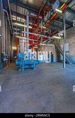 Compressor room in ammonia-cycle industrial refrigeration cold-storage ...