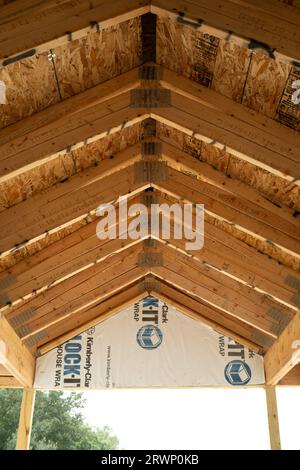 Roof of entranceway of a new home under construction Stock Photo