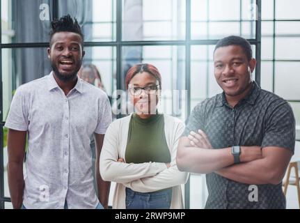 shooting gallery of dark-skinned businessmen sit in the office Stock Photo