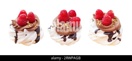 Chocolate mini pavlova cakes with whipped cream decorated with fresh raspberries, isolated on white background, png. Stock Photo