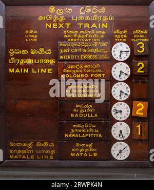 Asia, Sri Lanka, Kandy. Railway timetable in Kandy Railway station Stock Photo