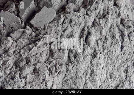 Gray sand close-up. Sand texture in full screen. Abstract background. Stock Photo