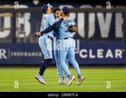 Toronto Blue Jays outfielders Daulton Varsho, left, George Springer,  center, and Kevin Kiermaier react at the end of a baseball game against the  Baltimore Orioles, Wednesday, June 14, 2023, in Baltimore. The