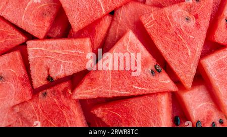 Top view of fresh red watermelon slices background. Healthy eating concept Stock Photo