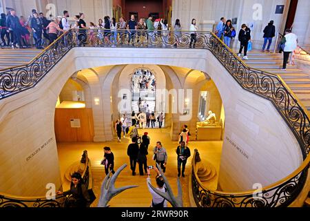 People enjoying a visit to the Louvre Museum in Paris France Stock Photo