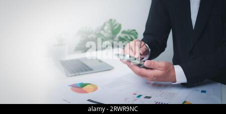 Businessman checking email on the phone screen. New email notification concept for business email communication and digital marketing. Inbox receives Stock Photo