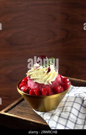 Bing fen, Sichuan Cold ice Jelly with bayberry,Korean shaved ice dessert with sweet toppings, matcha red beans Bingsu Stock Photo