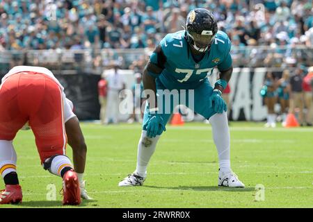 Jacksonville Jaguars offensive tackle Anton Harrison (76) puts on his helmet  before a drill during an NFL football practice, Monday, June 12, 2023, in  Jacksonville, Fla. (AP Photo/John Raoux Stock Photo - Alamy