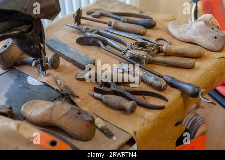 Shoemaker, various tools on work table, Rhineland-Palatinate, Germany, Europe Stock Photo