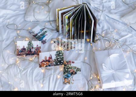 Photos of children against Christmas lights background Stock Photo