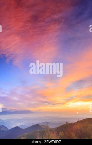 Mt. Asama and the morning glow and sunrise from near Utsukushigahara Open-Air Museum Stock Photo