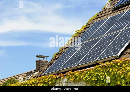 Photovoltaics versus heating oil Stock Photo