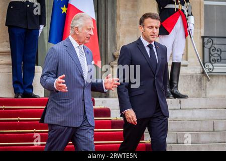Paris, France. 20th Sep, 2023. French President Emmanuel Macron and King of the United Kingdom Charles III seen leaving the Elysée Palace. King of the United Kingdom Charles III and Queen Camilla are making their first official visit to France since their accession to the throne. After the reception and ceremony at the Arc de Triomphe, they went accompanied by French President Emmanuel Macron and First Lady Brigitte Macron to the Elysée Palace in Paris, France. Credit: SOPA Images Limited/Alamy Live News Stock Photo