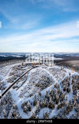 Fichtelberg highest mountain in Erzgebirge in winter snow aerial view photo portrait format in Oberwiesenthal, Germany Stock Photo