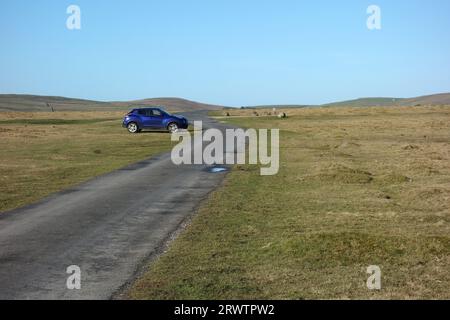 Blue Car Parked up at 'Street Gate' near Malham Tarn on the Mastiles Lane an Old 'Roman Road' near Malham in the Yorkshire Dales National Park. Stock Photo