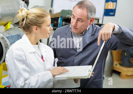 workers on analysis of data Stock Photo