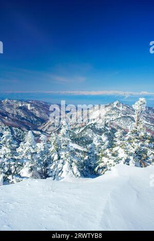 Mt. Yokote and Mt. Shiroumadake and other mountains in the Northern Alps Stock Photo